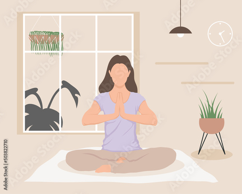 woman practicing yoga indoor