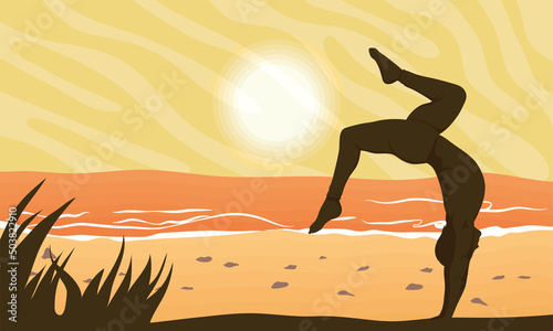 man practicing yoga on the beach