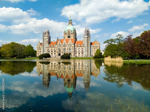 The New Town Hall (Neues Rathaus) in Hannover, Germany with reflection in the lake photo
