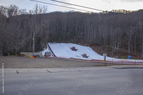 Machines a mountain side for snow sledding in the winter in Maggie Valley, NC, the USA photo