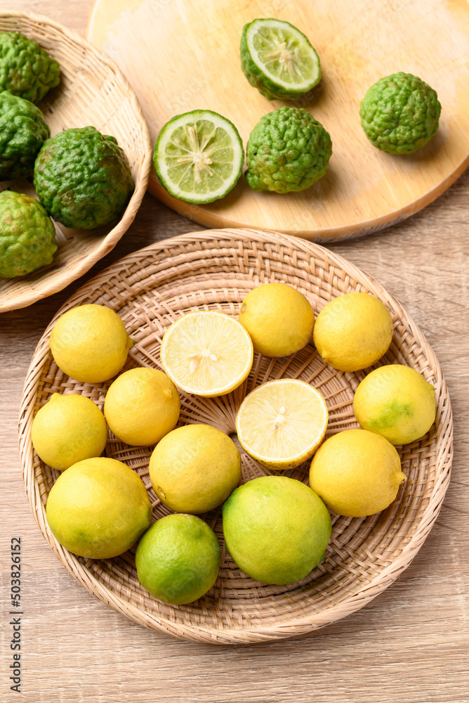 Yellow lime and kaffir lime, Asian citrus fruit 
