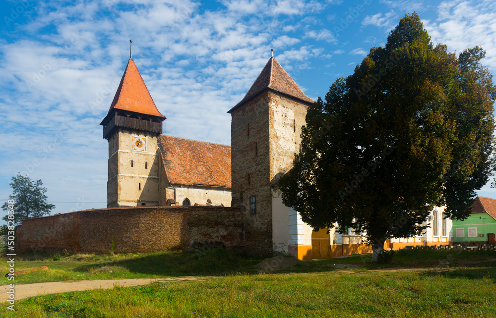 View of medieval fortified church of Brateiu, Romania