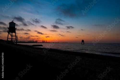 harwich seascape twilight sunrise with lighthouse photo