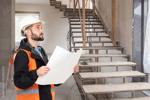 An engineer or architect in...