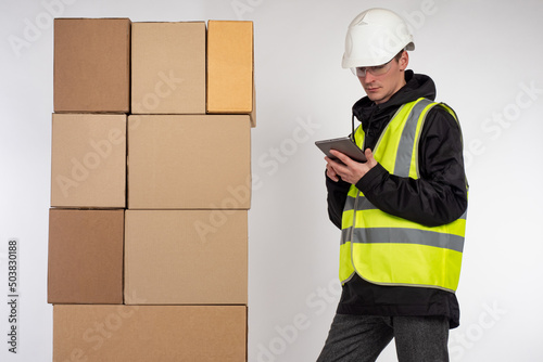 Delivery man next to the bo...