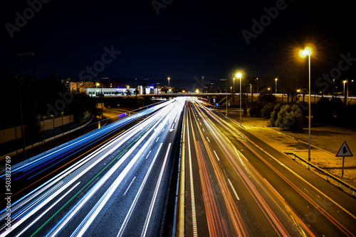 traffic on highway at night © Adri