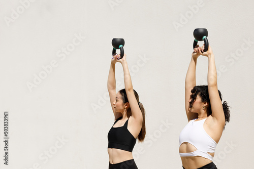 Sporty fit active young woman doing exercise strong sportswoman wear activewear training abs core muscles workout routine in extirior sport gym 