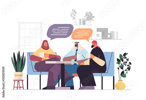 arab businesspeople with chat bubbles discussing during meeting business communication concept