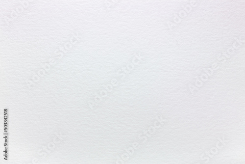 simple white watercolor paper. highly-textured background for artwork.
