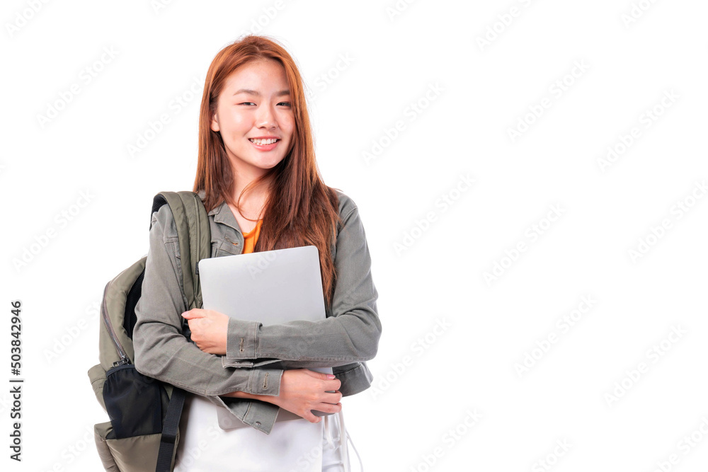 Portrait of smiling a beautiful young woman student holding textbook and laptop computer - studying online e-learning system Portrait of smiling a beautiful young woman student holding textbook and laptop computer - studying online e-learning system