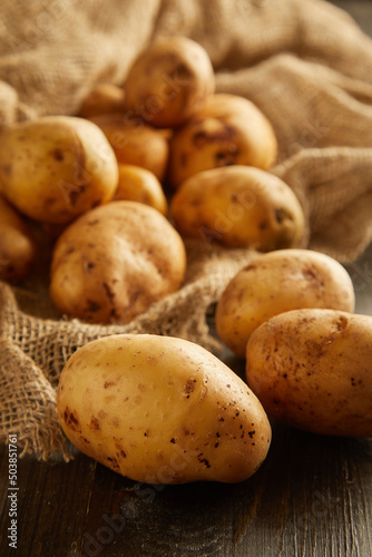 potatoes on a wooden background