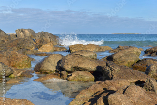  rocks in the sea and wave background on a Brittany beach -France