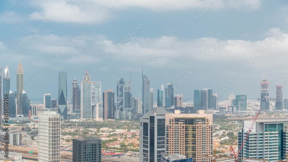 Rows of skyscrapers in financial district and business bay in Dubai aerial timelapse.