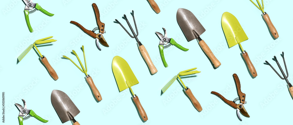 Set of gardening tools on light blue background - obrazy, fototapety, plakaty 