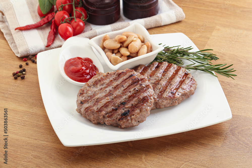 Grilled beef burger cutlet with sauce Grilled beef burger cutlet with sauce
