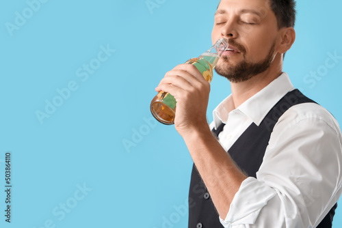 Handsome bartender drinking...