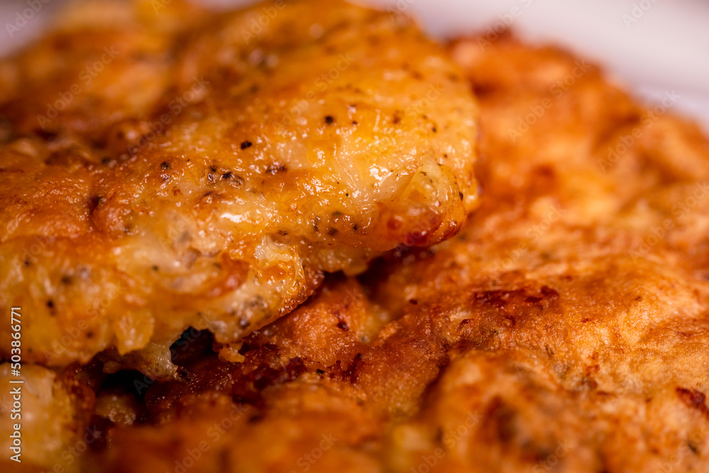 Milanese beef cutlet, tasty, appetizing, juicy, crispy. Selective focus, shallow depth of field. Delicious food concept Milanese beef cutlet, tasty, appetizing, juicy, crispy. Selective focus, shallow depth of field. Delicious food concept