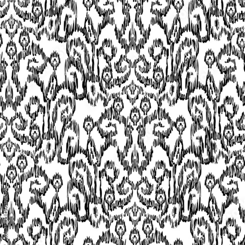 Seamless pattern - Tribal Art Ikat in traditional classic blue and white colors. Damascus - in Syrian Flower Pattern. Boho style. Printing on fabric. Ornamental plant pattern imitating weaving embroid