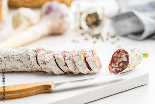 Wallpaper Mural Traditional sausage with white mold. Dried sliced pork salami on cutting board. Torontodigital.ca