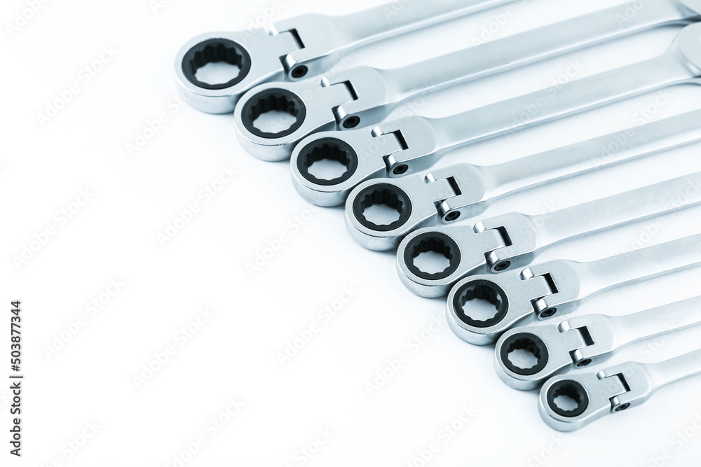 set of spanners on white background. cap wrenches with ratchet set of spanners on white background. cap wrenches with ratchet