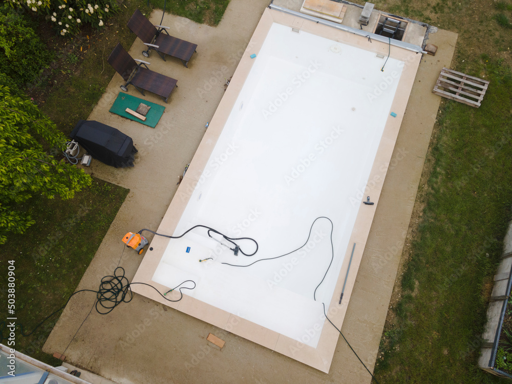 Drone flight over pool in the middle of greenery just left out and cleaned Drone flight over pool in the middle of greenery just left out and cleaned