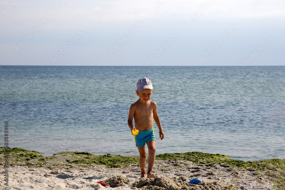 little boy on the sea beach