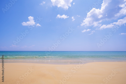 Summer sea Tropical sandy beach with blue ocean and blue sky background image for nature background or summer background © panya99