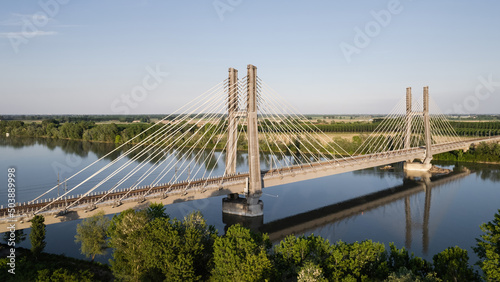 The cable stayed bridge over Po river, high speed train railroad.