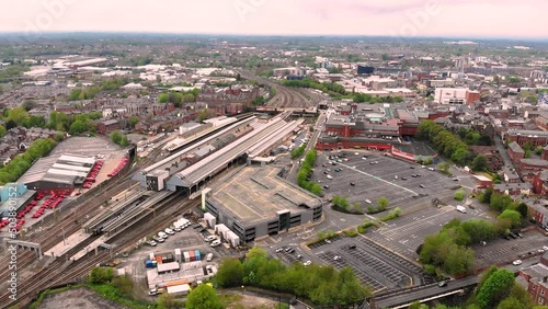 Reverse aerial view of Preston train station on a cloudy day photo