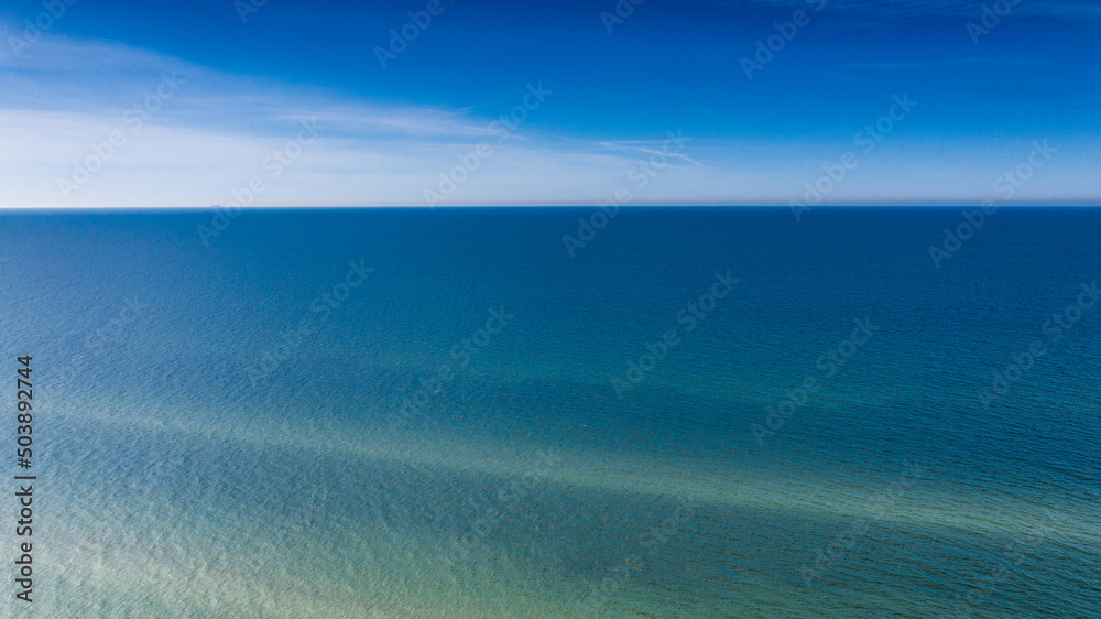 Blue sea water and blue sky in a sunny day. Blue sea water and blue sky in a sunny day.