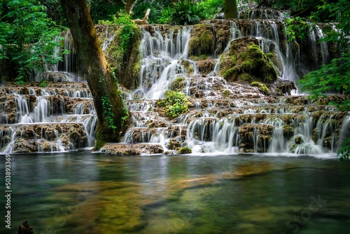 Fototapeta Naklejka Na Ścianę i Meble -  Krushunski Waterfall in the Forest Bulgaria