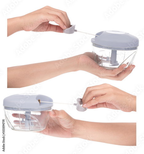 Tela Set of Hand holding Manual food chopper Isolated on White Background