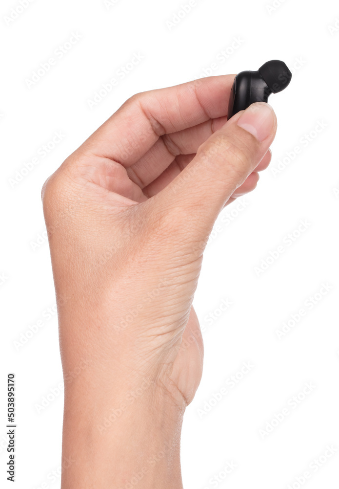 hand holding bluetooth headphones for mobile audio isolated on white background. hand holding bluetooth headphones for mobile audio isolated on white background.