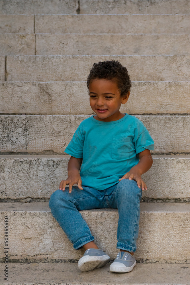 Portrait of African American boy. Happiness. Summer clothes. Portrait of African American boy. Happiness. Summer clothes.