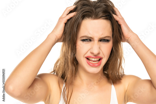 Young woman hand itchy scalp, Hair care concep