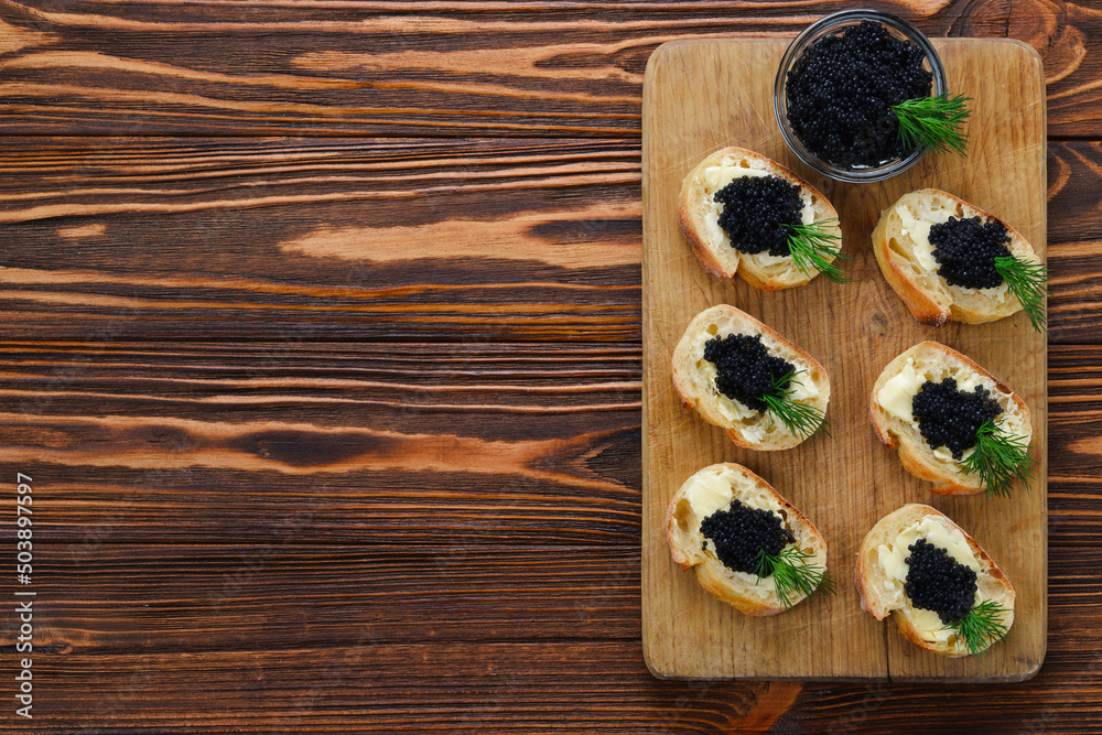 Toastes with black caviar. Spase for text or design. Toastes with black caviar. Spase for text or design.