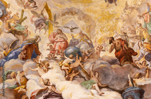 VALENCIA, SPAIN - FEBRUARY 14, 2022: The central part of fresco in cupola of the church Basilica de la Mare de Deu dels Desamparats by Antonio Palomino (1701). photo