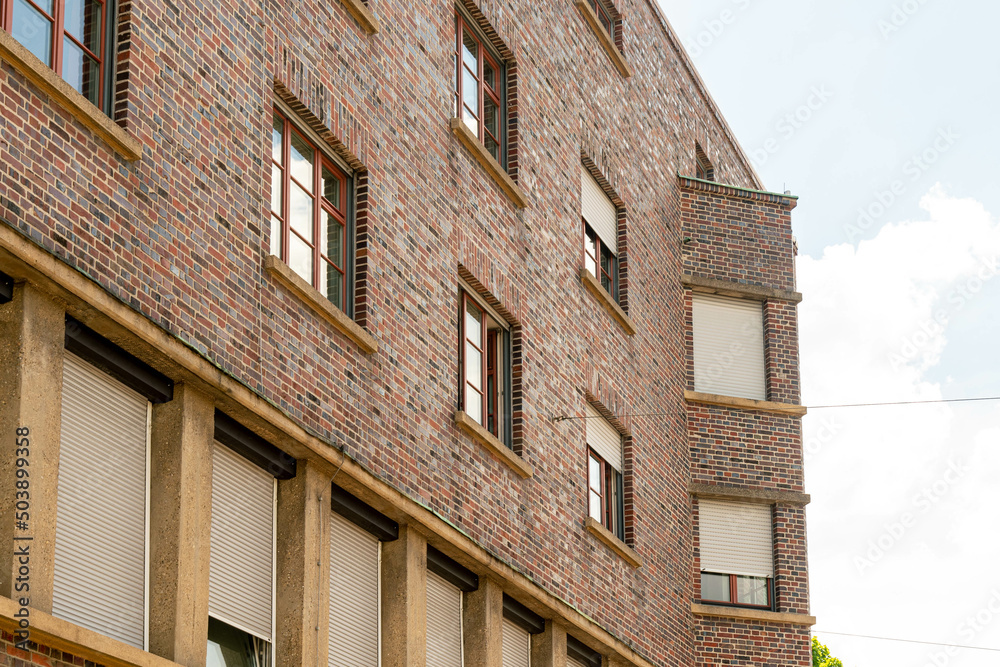 Brick house façade with bay window