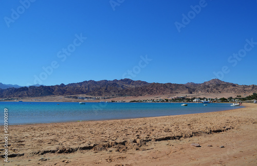 The view of Dahab lagoon in the background of distant mountains. The Sinai peninsula, Egypt. © Юрій Борисов