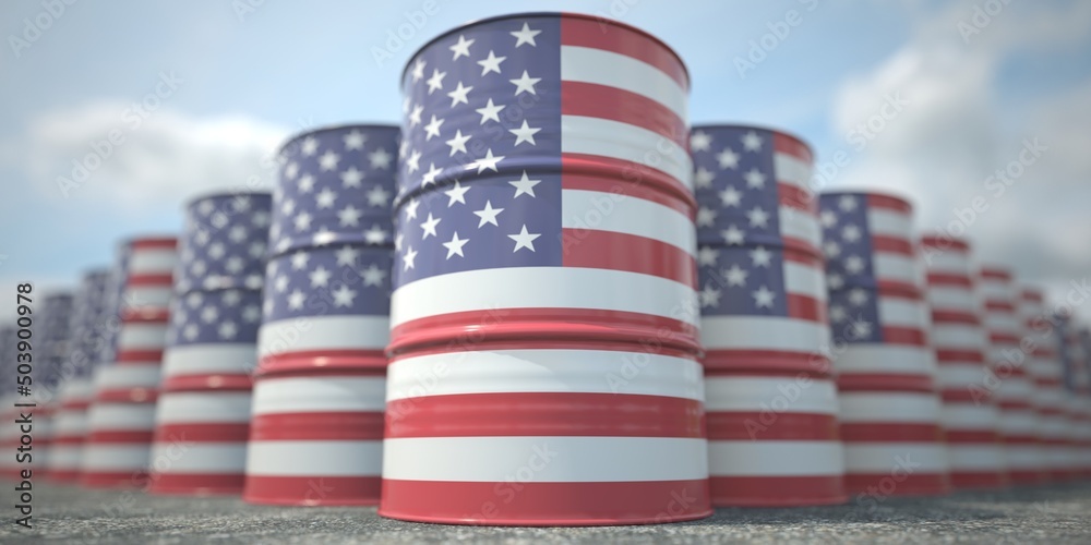 Obraz premium Barrels or oil drums with flag of the USA. Petroleum or chemical industry related 3D rendering