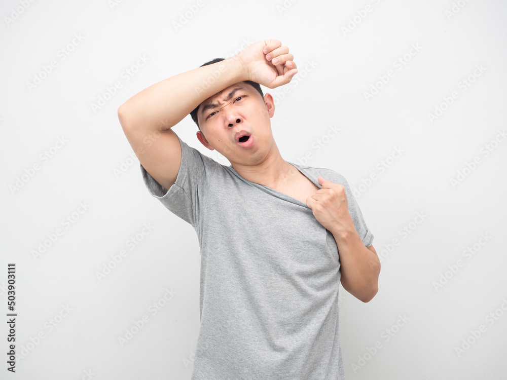 Man feeling weather it hot gesture heat stroke Man feeling weather it hot gesture heat stroke