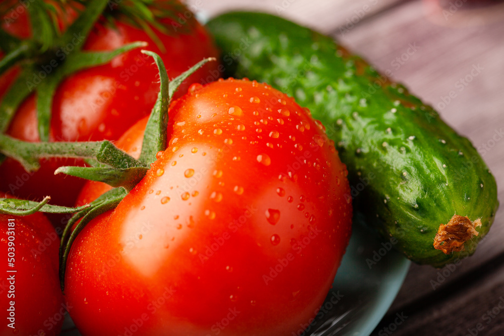 fresh vegetables on a plate with water drops