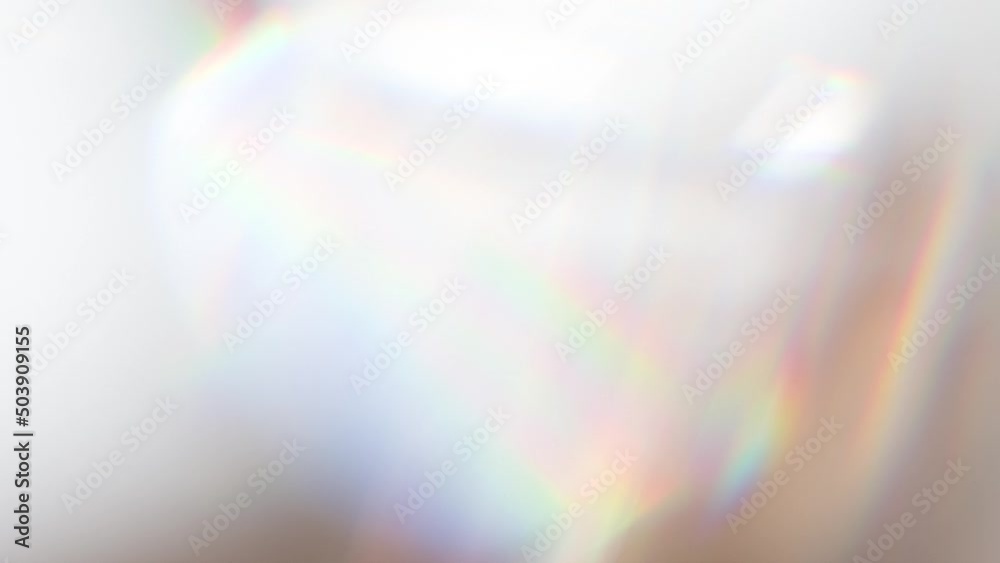 Slow Play Rainbow Crystal. Loop. The light passes through the facets of a slowly rotating diamond and creates repetitive sparkling highlights and rainbow colors