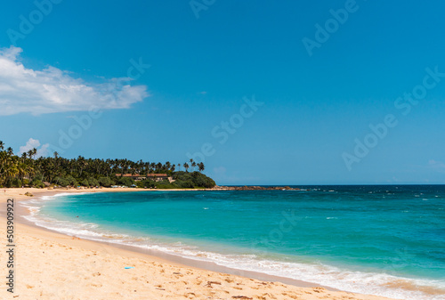 Tropical landscape, paradise beach against the blue ocean, perfect vacation in silence.