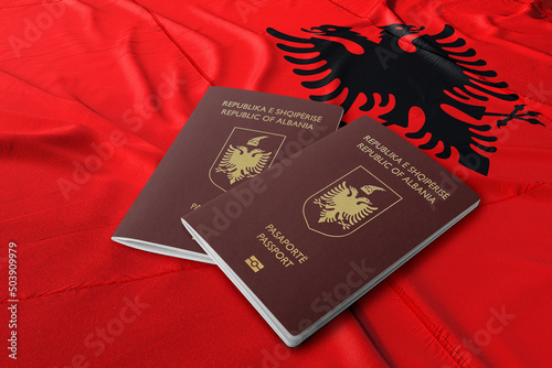 Albanian passport on its flag, The Albanian passport is a travel document issued by the Ministry of Interior to Albanian citizens to enable them to travel abroad photo