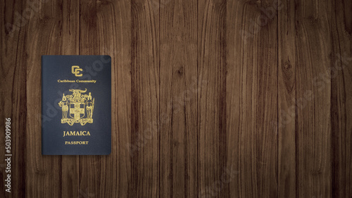 Jamaican passport on a wooden background ,The Jamaican passport is issued to citizens of Jamaica for international travel.