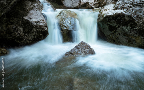 Close up of a ittle waterfall with rocks. Long exposure