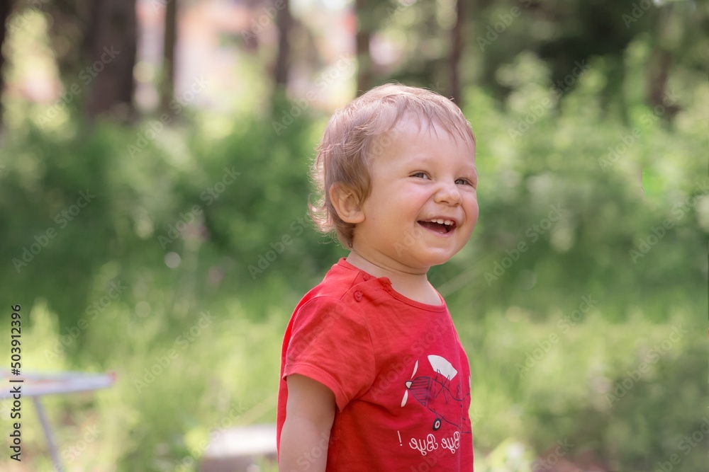 portrait of cute smiling little boy outdoors. portrait of cute smiling little boy outdoors.