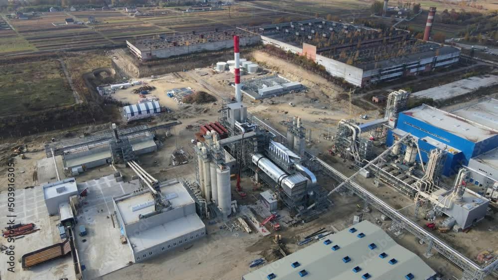 Aerial shot of a modern plant that processes wood and produces particleboard Aerial shot of a modern plant that processes wood and produces particleboard