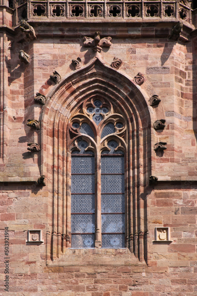 Pointed ogive arch with gothic window at Rodez cathedral in Aveyron, France